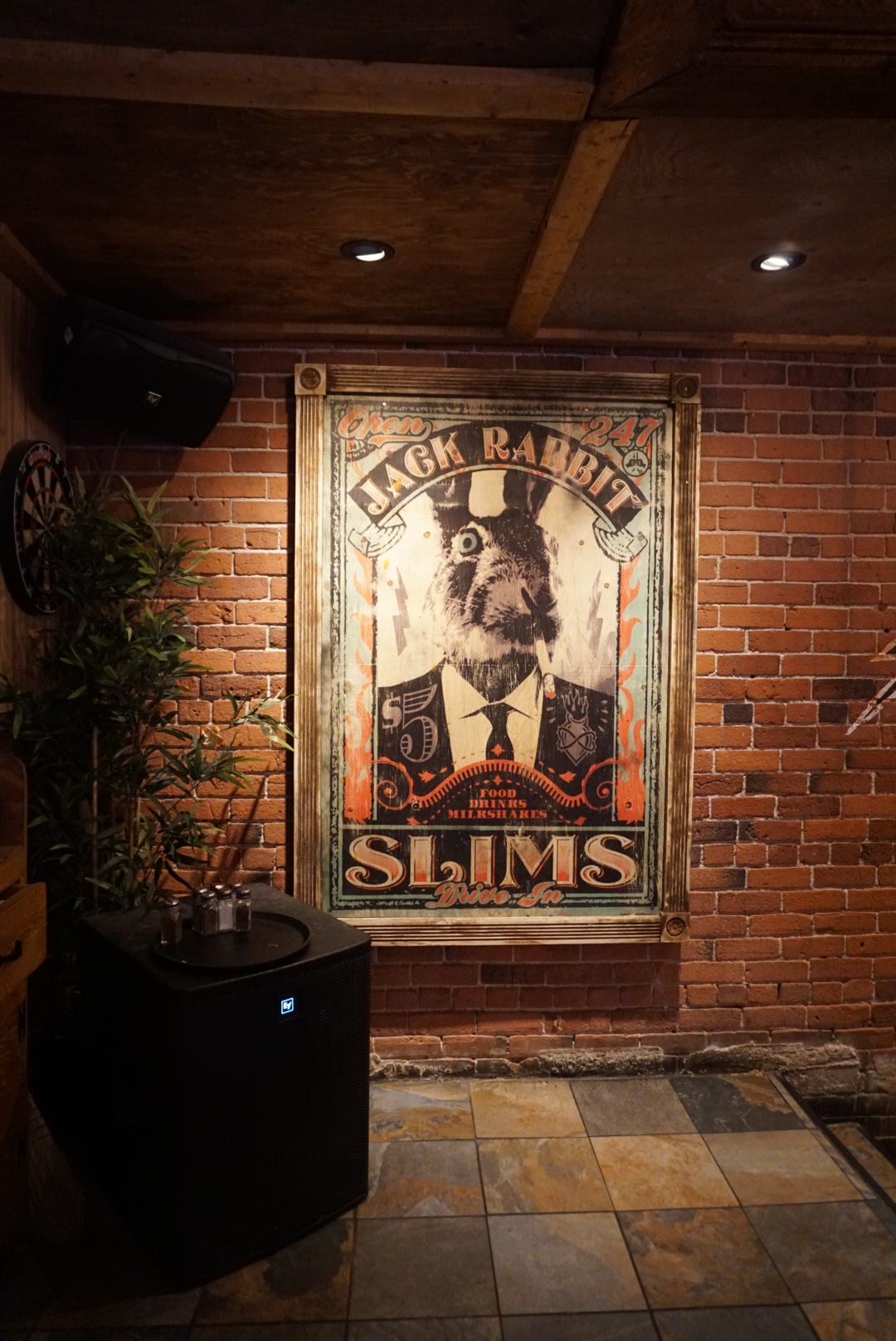 Wall Art is a rabbit in a suit at Warehouse Restaurant in Montreal 